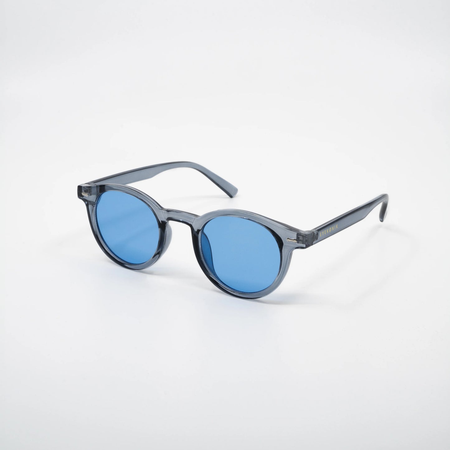 Storm | Zonnebril met blauwe glazen | Transparant grijs montuur