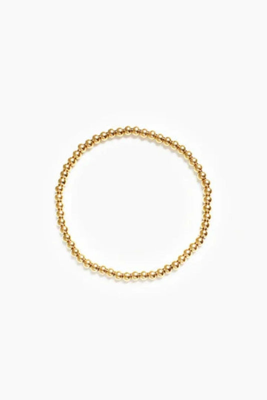 CrownLuxe armband – elegant gouden kralenontwerp met een koninklijke charme. Een verfijnd accessoire dat perfect is voor elke gelegenheid en een vleugje luxe toevoegt aan uw look