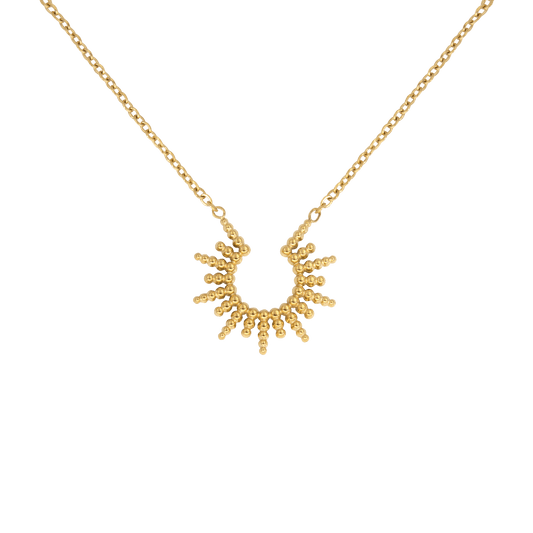 Minimalistische gouden Feel Grace ketting met een uniek zonvormig ontwerp. Deze verfijnde ketting straalt elegantie uit en is perfect als statement sieraad of in combinatie met andere kettingen. Een tijdloos accessoire voor elke gelegenheid.