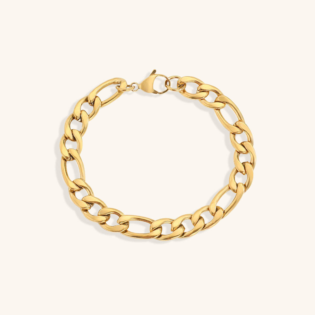 Lusso Vero armband met een stijlvolle gouden schakelketting, elegant gepresenteerd op een zachte neutrale achtergrond. Ideaal voor een verfijnde en tijdloze look.