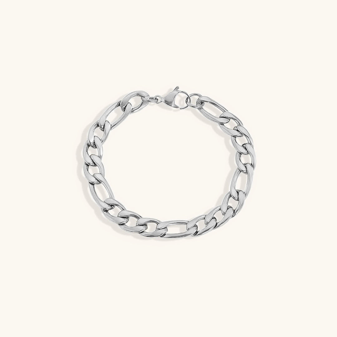 Lusso Vero armband met een verfijnde zilveren schakelketting, afgebeeld tegen een zachte crèmekleurige achtergrond. Perfect voor een tijdloze en elegante look.