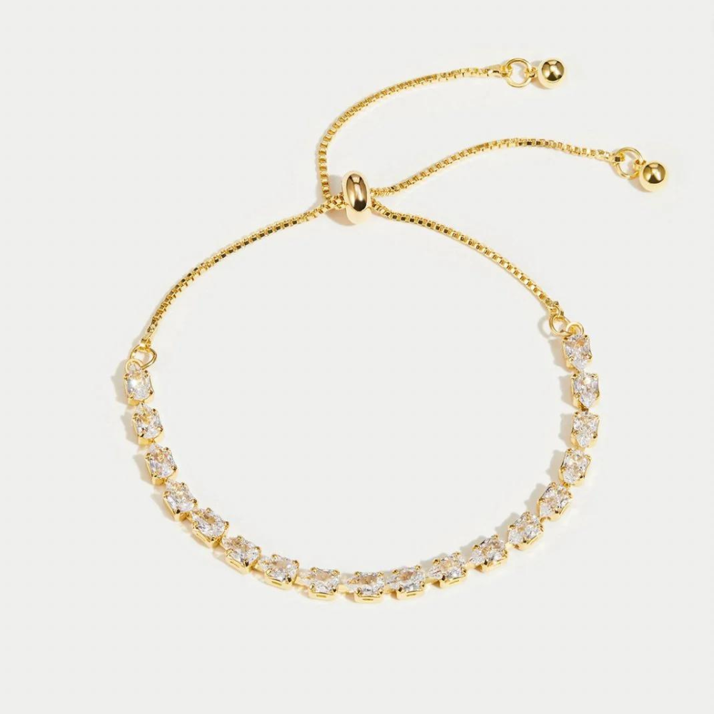 PureChic armband met sprankelende steentjes en een gouden afwerking, ontworpen voor een elegante en verfijnde uitstraling