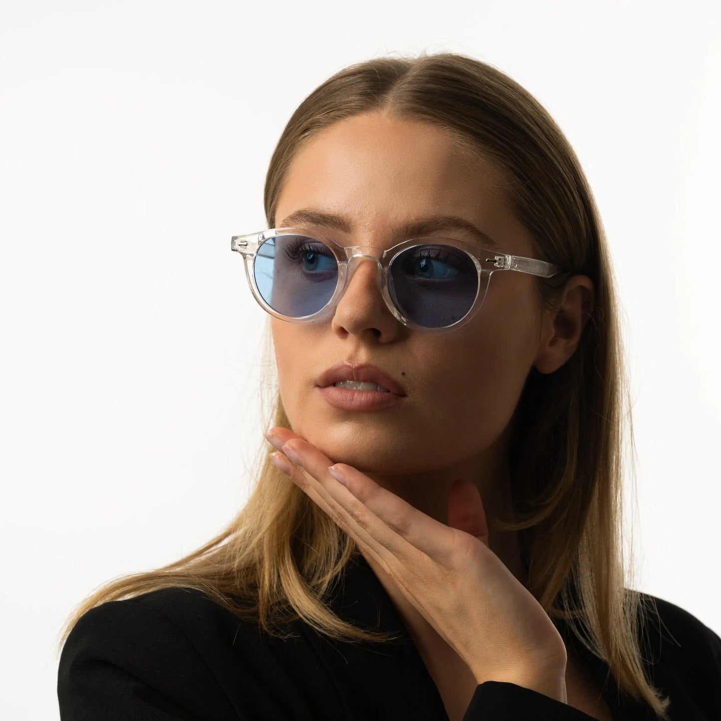 Ocean | Zonnebril met blauwe glazen | Transparant blauw montuur